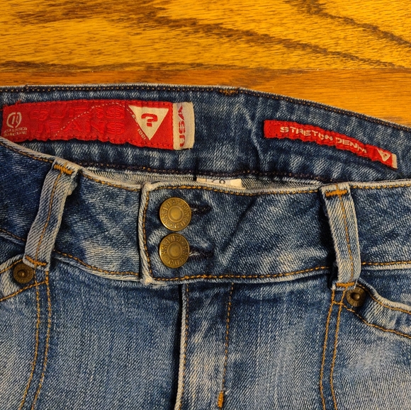 GUESS stretch denim, low rise, boot cut jeans in light, slightly distressed wash - Picture 2 of 5